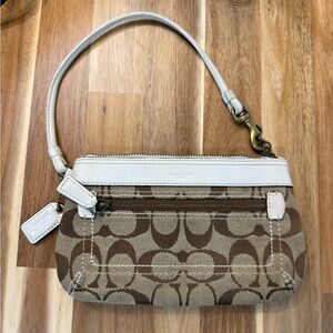 Coach Signature Canvas & Leather
Wristlet With Zip Closure!